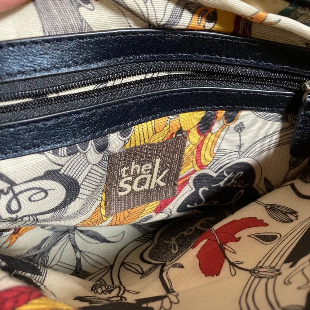 The Sak Black Leather Foldover Crossbody Bag Floral Bird Print Lining‎ No Strap